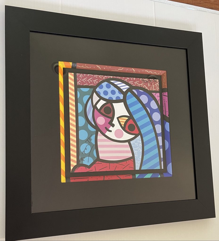 Romero Britto Print professionally framed in yellow black frame ready to  display